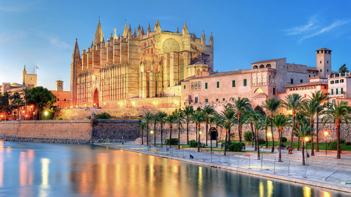 Best off peak holiday destinations in Spain: Catedral-Basílica de Santa María de Mallorca in Palma, Spain in the early evening